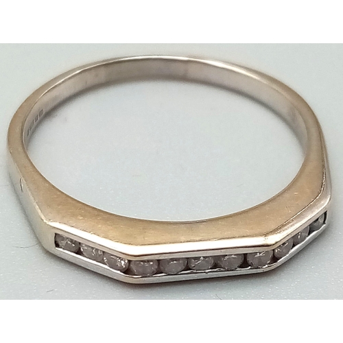 561 - A Vintage 18K White Gold and Diamond Half-Eternity Ring. Size P 1/2. 2.8g total weight.