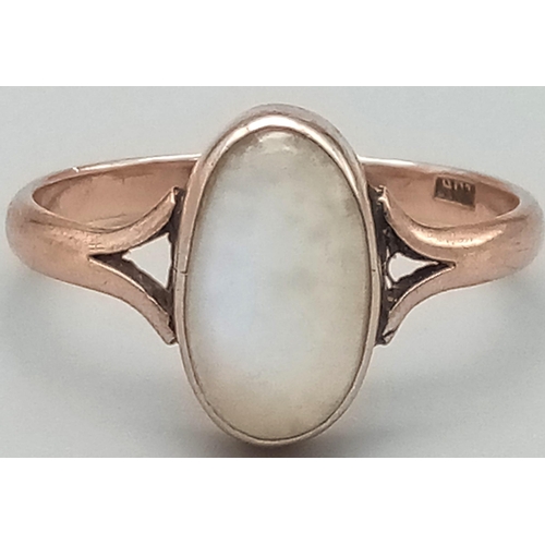 567 - A Vintage 9K Rose Gold White Stone (possibly opal) Ring. 
Size P. 2.1g total weight.