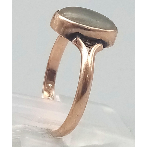 567 - A Vintage 9K Rose Gold White Stone (possibly opal) Ring. 
Size P. 2.1g total weight.