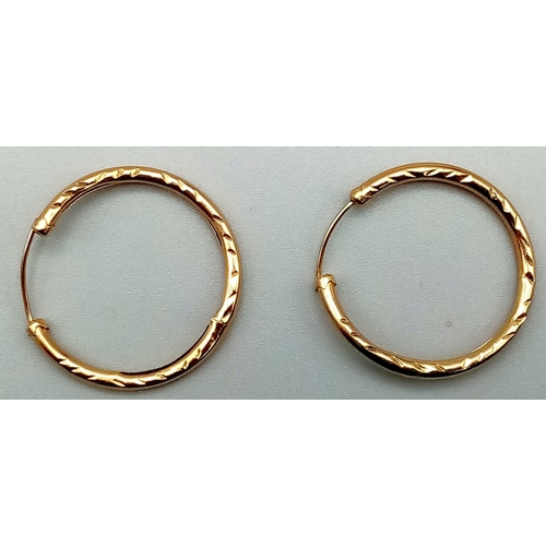 575 - A Pair of Vintage 9K Yellow Gold Hoop Earrings. 1.4g total weight.