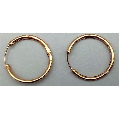 575 - A Pair of Vintage 9K Yellow Gold Hoop Earrings. 1.4g total weight.