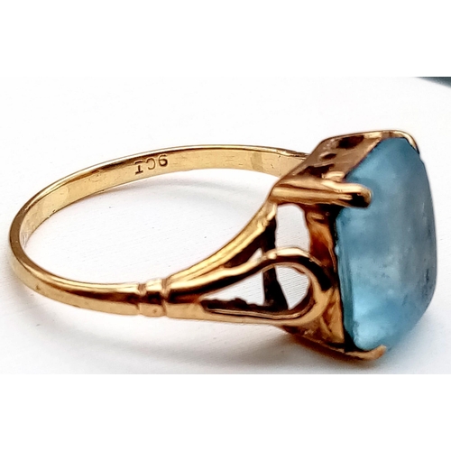 581 - A 9K Yellow Gold Aquamarine Gemstone Ring. Size J. 1.9g total weight.