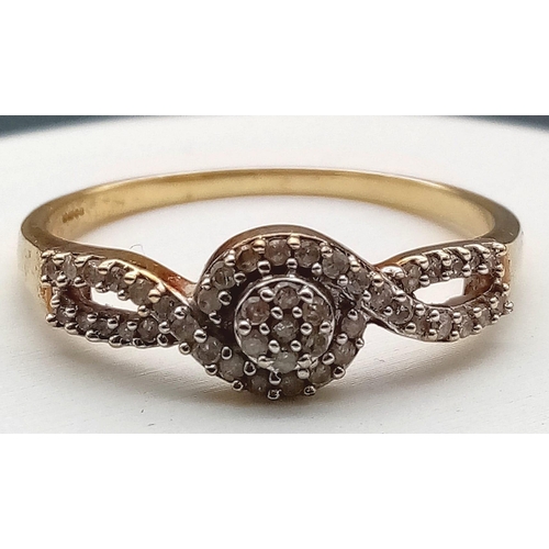 582 - A Vintage 9K Yellow Gold Diamond Crossover Ring. Size R. 1.87g total weight.