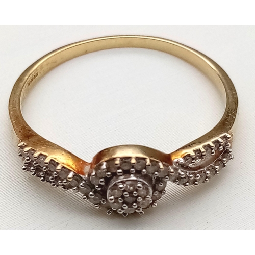 582 - A Vintage 9K Yellow Gold Diamond Crossover Ring. Size R. 1.87g total weight.