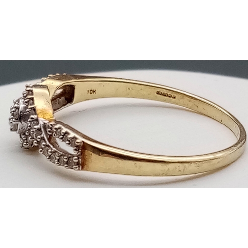 582 - A Vintage 9K Yellow Gold Diamond Crossover Ring. Size R. 1.87g total weight.