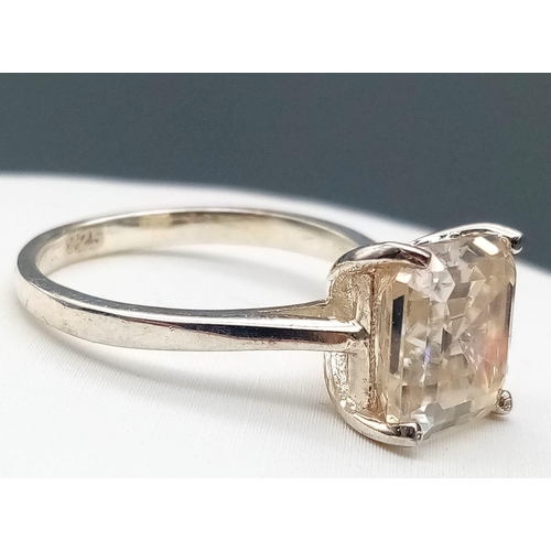 631 - A 3.85ct Princess Cut White Moissanite Ring. Set in 925 Silver. Size N 1/2. Comes in a presentation ... 