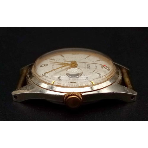 1187 - A Vintage Smiths 5 Jewels Watch Case - 34mm. White dial with date window. Mechanical movement in wor... 