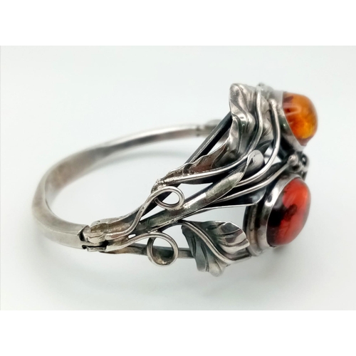 133 - A gorgeous, real ART NOUVEAU, sterling silver bangle with a naturalistic design and two large Baltic... 