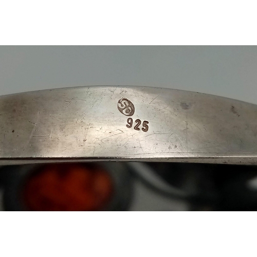 133 - A gorgeous, real ART NOUVEAU, sterling silver bangle with a naturalistic design and two large Baltic... 