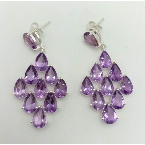 496 - A Pair of Teardrop Amethyst Gemstone Dangler Earrings set in 925 Silver. 5cm dangle.