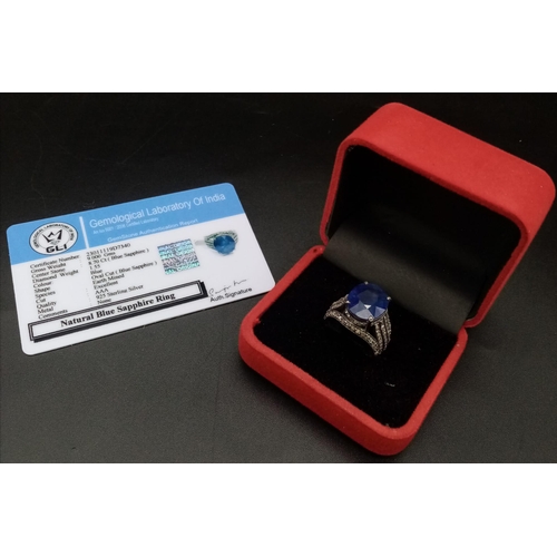 628 - An 8.70ct Blue Sapphire Ring - with 1.55ct of Diamond Accents. Set in 925 Silver. Size M. 7.3g total... 