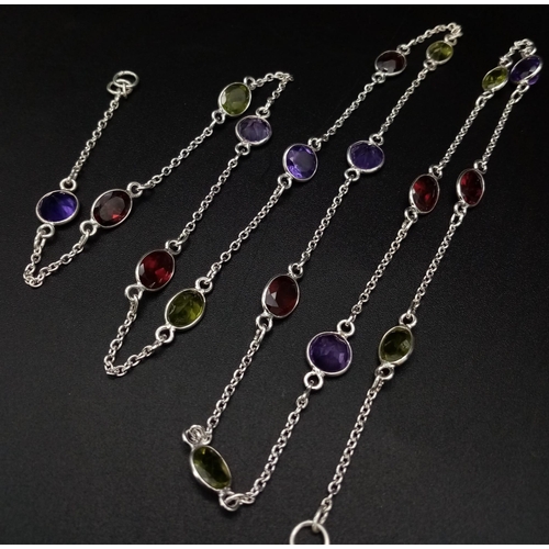 637 - A Multi-Gemstone Necklace (70cm) - Includes: Garnet, Amethyst, Peridot with a pair of matching drop ... 