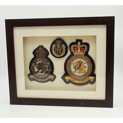 742 - A Framed and Glazed Set of Three Vintage Royal Airforce Cloth Badges. 28x23cm.