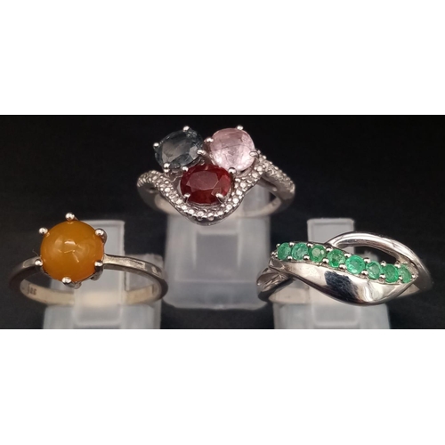 1112 - Three 925 Silver Gemstone Rings - Peridot, mixed and opal. 
2 x N, 1 x R.