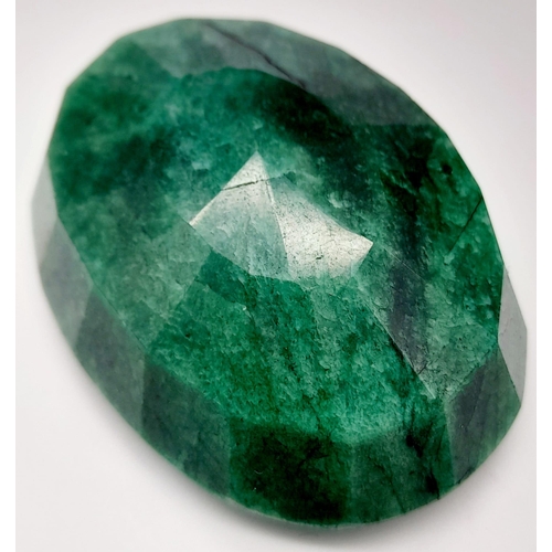 1190 - A 235 Ct Faceted Emerald. Oval Shape. Colour enhanced. GLI Certified