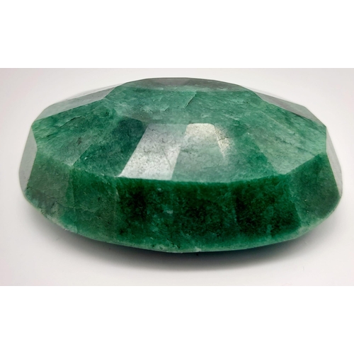 1190 - A 235 Ct Faceted Emerald. Oval Shape. Colour enhanced. GLI Certified