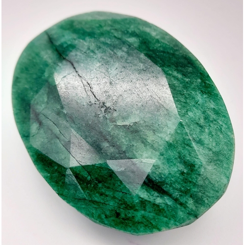 1190 - A 235 Ct Faceted Emerald. Oval Shape. Colour enhanced. GLI Certified