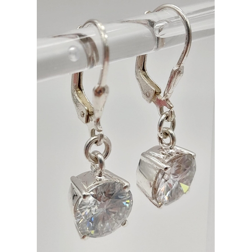 15 - A Pair of White Diamond (laboratory) Drop Earrings Set in 925 Silver. 4ct diamond total approx. 9mm ... 