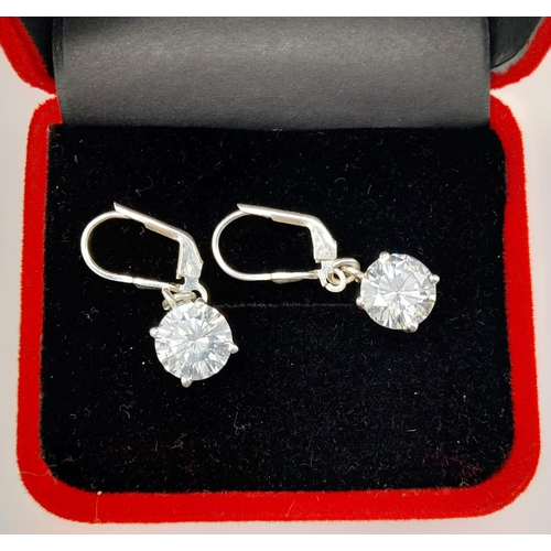 15 - A Pair of White Diamond (laboratory) Drop Earrings Set in 925 Silver. 4ct diamond total approx. 9mm ... 