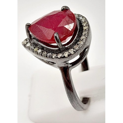 26 - A 5ct Antique-Style Pear Cut Ruby Gemstone Ring Set in 925 Silver - with 0.27ct of Diamond Surround.... 