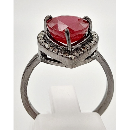 26 - A 5ct Antique-Style Pear Cut Ruby Gemstone Ring Set in 925 Silver - with 0.27ct of Diamond Surround.... 