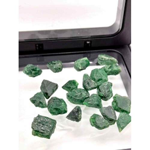 505 - A 39ct Natural Tsavorite Lot. 18 rough pieces. AIG Milan Certified.