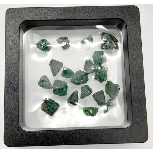 505 - A 39ct Natural Tsavorite Lot. 18 rough pieces. AIG Milan Certified.