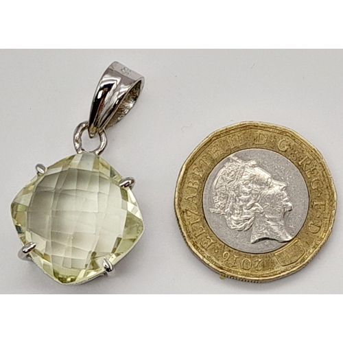 512 - A Lemon Quartz 925 Silver Pendant. Approx 20ct Gemstone. Checkerboard cut with a basket setting. 4cm