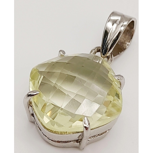 512 - A Lemon Quartz 925 Silver Pendant. Approx 20ct Gemstone. Checkerboard cut with a basket setting. 4cm