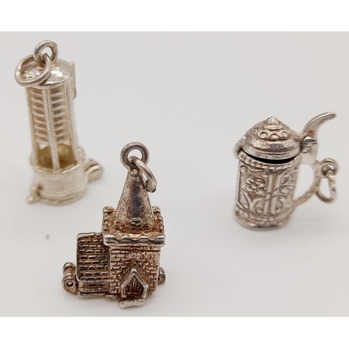 526 - Twelve 925 Silver Charms/Pendants. Please see photos for finer details. 45.4g total weight.