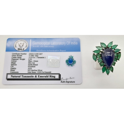 58 - A 13ct Tanzanite Cabochon Gemstone Ring with 8ct of Emerald Leaves and 0.30ct of Diamond Accents on ... 