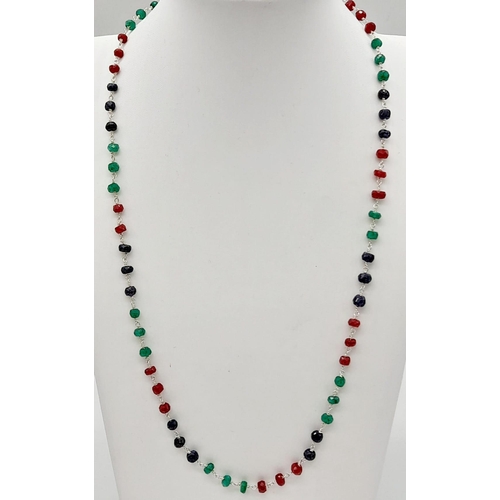 820 - An Emerald, Ruby and Sapphire Necklace with a Pair of Matching Drop Earrings. Necklace - 56cm. Drop ... 