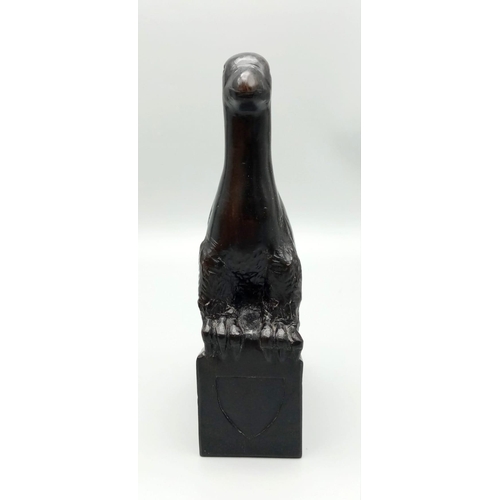 569 - An Ebony Wood Sculpture from the Classic Gibbs Collection.
21cm tall