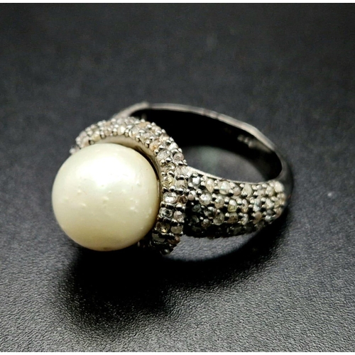 606 - An Art Deco Style 9ct South Sea Pearl Ring with 1.50ct of Diamond Accents. Set in 925 Silver. Size N... 