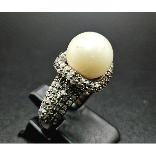 606 - An Art Deco Style 9ct South Sea Pearl Ring with 1.50ct of Diamond Accents. Set in 925 Silver. Size N... 