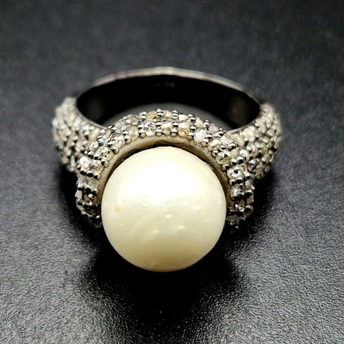 606 - An Art Deco Style 9ct South Sea Pearl Ring with 1.50ct of Diamond Accents. Set in 925 Silver. Size N... 