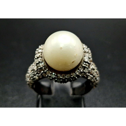 606 - An Art Deco Style 9ct South Sea Pearl Ring with 1.50ct of Diamond Accents. Set in 925 Silver. Size N... 