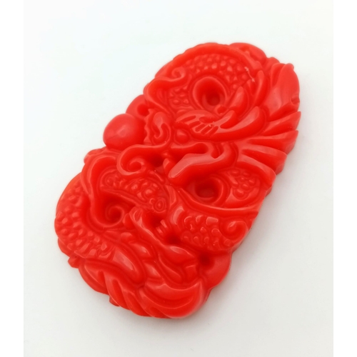 1185 - A Red Jade Chinese Dragon Pendant. 5cm