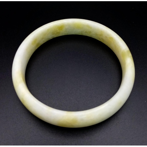 490 - A High Quality Chinese Cauliflower Jade Bangle. 65mm inner diameter. 17mm width.