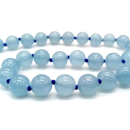 538 - A Sky-Blue Jade Beaded Necklace and Earring Set. 8mm beads. 42cm necklace length.