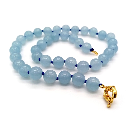 538 - A Sky-Blue Jade Beaded Necklace and Earring Set. 8mm beads. 42cm necklace length.