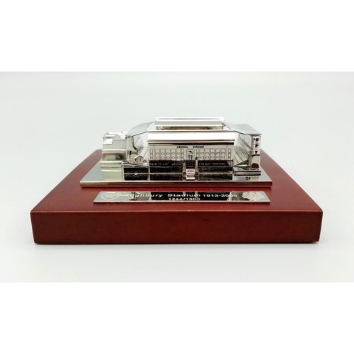 73 - A Limited Edition Arsenal FC Aquascutum Highbury Stadium Model. A silver-toned metal model commemora... 