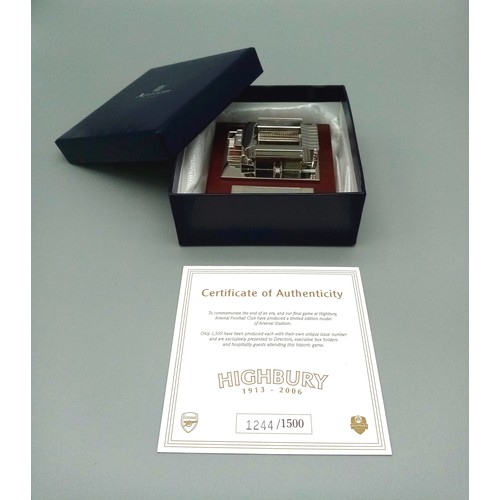 73 - A Limited Edition Arsenal FC Aquascutum Highbury Stadium Model. A silver-toned metal model commemora... 