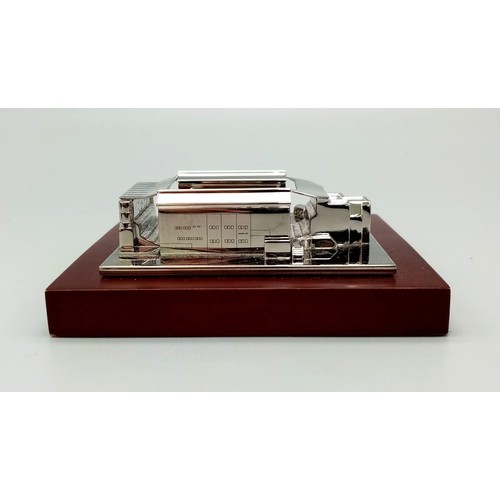 73 - A Limited Edition Arsenal FC Aquascutum Highbury Stadium Model. A silver-toned metal model commemora... 