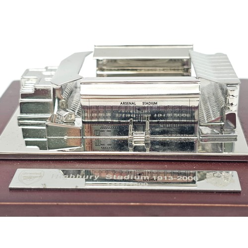 73 - A Limited Edition Arsenal FC Aquascutum Highbury Stadium Model. A silver-toned metal model commemora... 