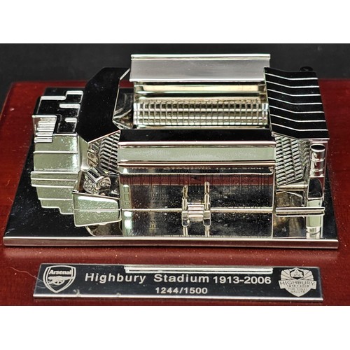 73 - A Limited Edition Arsenal FC Aquascutum Highbury Stadium Model. A silver-toned metal model commemora... 