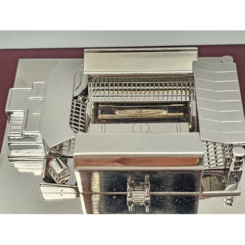 73 - A Limited Edition Arsenal FC Aquascutum Highbury Stadium Model. A silver-toned metal model commemora... 