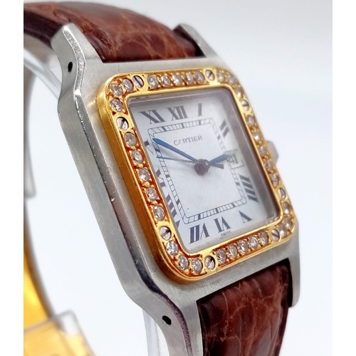 280 - A LADIES CARTIER SANTOS AUTOMATIC TANK WATCH WITH DIAMOND AND GOLD BEZEL, ORIGINAL CARTIER STRAP AND... 