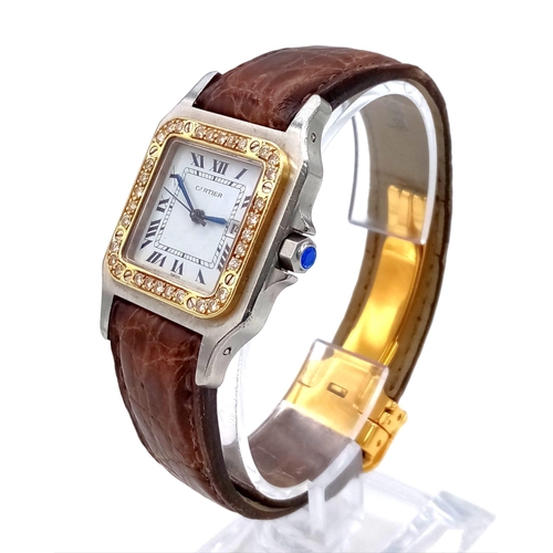 280 - A LADIES CARTIER SANTOS AUTOMATIC TANK WATCH WITH DIAMOND AND GOLD BEZEL, ORIGINAL CARTIER STRAP AND... 