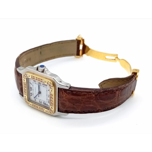 280 - A LADIES CARTIER SANTOS AUTOMATIC TANK WATCH WITH DIAMOND AND GOLD BEZEL, ORIGINAL CARTIER STRAP AND... 